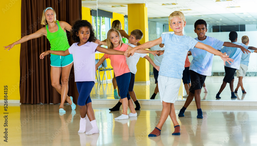 Children studying of partner dance at dance school. High quality photo