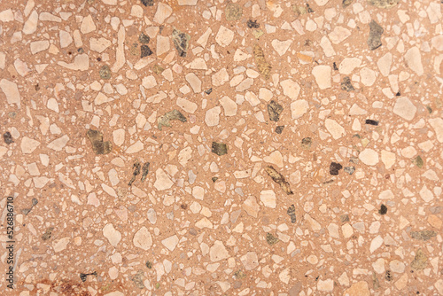 Beige gravel floor tile texture bg