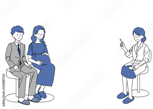 産婦人科医と説明を受ける若い夫婦