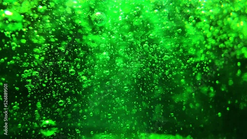 Green bubbles background. Bubbles floating into greeninsh viscous liquid.
 photo