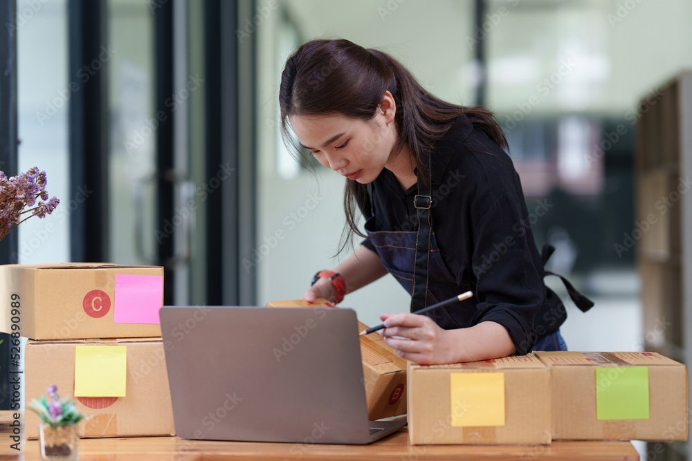 Starting Small business entrepreneur SME freelance Asian working at home Starting Small business entrepreneur SME freelance Asian working at home