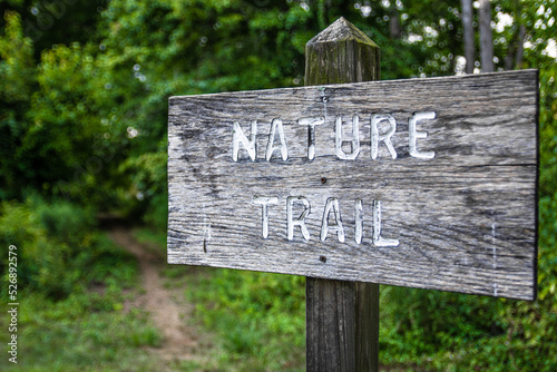 The 'Nature Trail' sign in the woods
