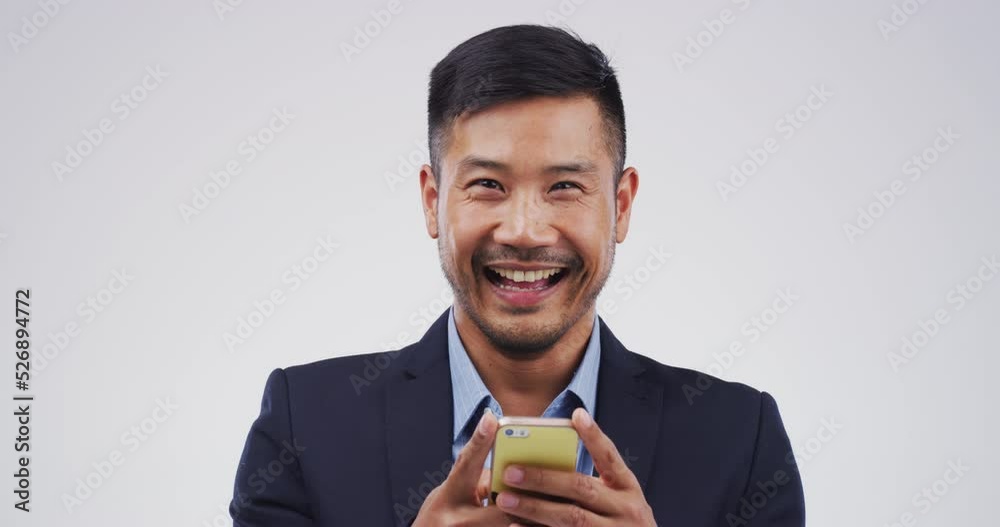 Businessman on phone in surprise, shock and wow face smile for sales success, bonus trading deal and good news notification on studio background. Portrait of lucky, winner and excited asian executive Businessman on phone in surprise, shock and wow face smile for sales success, bonus trading deal and good news notification on studio background. Portrait of lucky, winner and excited asian executive