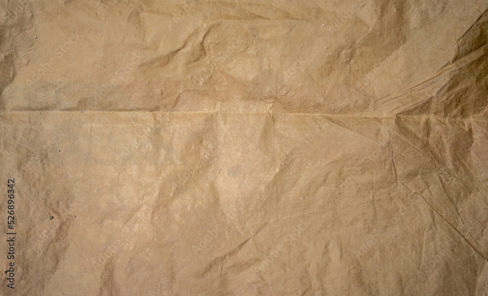 Obraz premium golden old paper with torn and crumpled texture for background