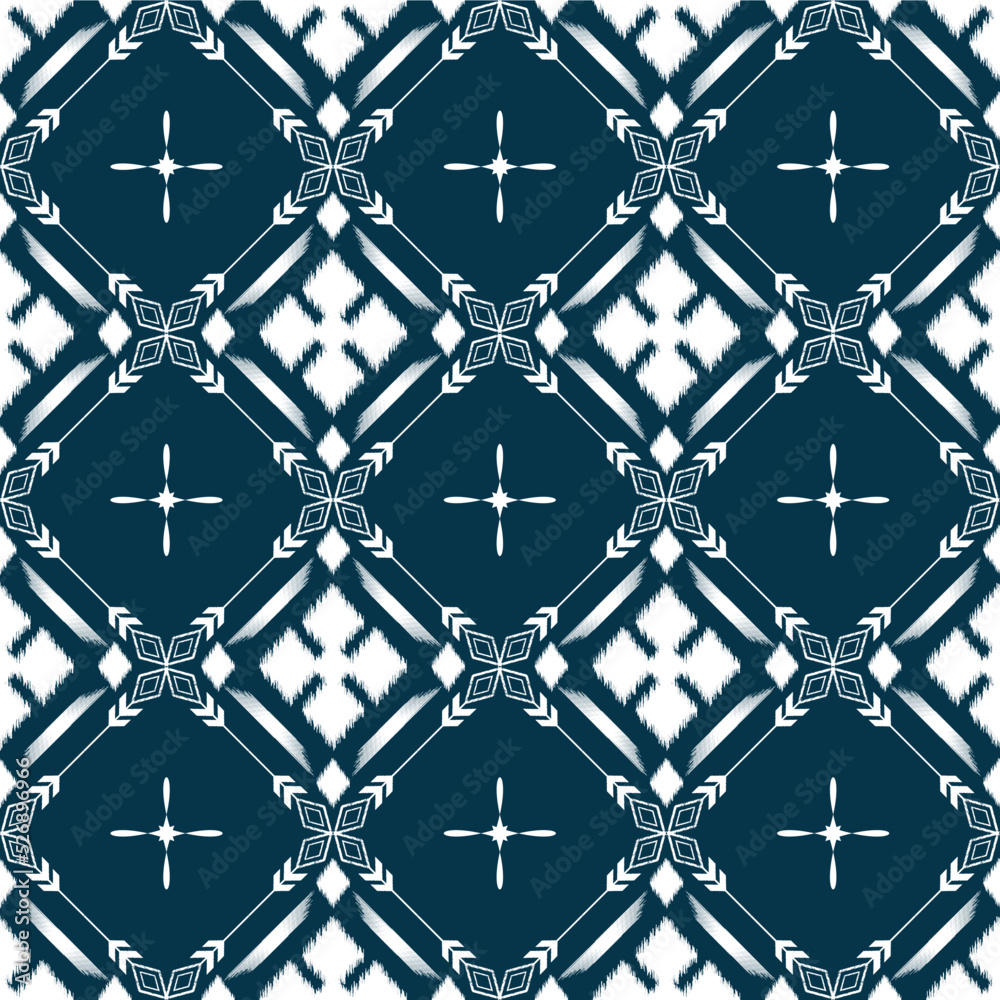 Naklejka premium Ikat ethnic background vector. Seamless pattern of white geometric shapes with star and flower on dark blue background.
