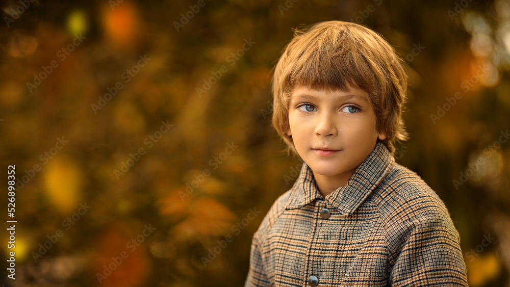 fair haired boy in coat fair haired boy in coat