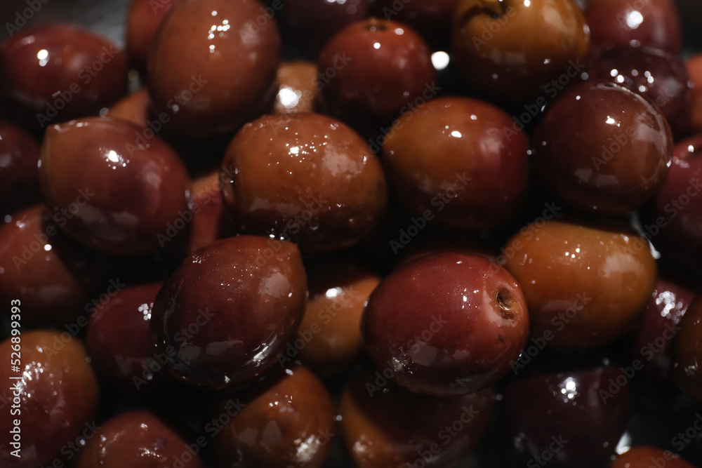 Delicious red olives as background, closeup Delicious red olives as background, closeup