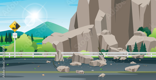 Rocks falling on the highway with stone warning signs.