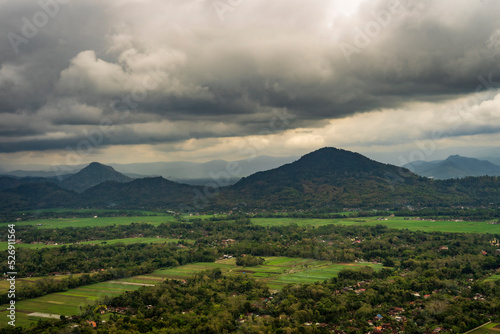 Cloudy Arial view of village with background of mountain in Trenggalek, East Java, Indonesia