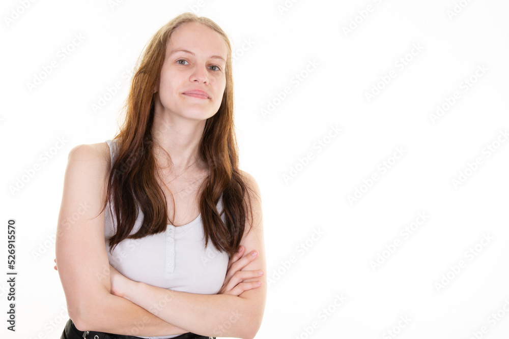Young confident and determined girl cross arms chest in self-assured pose smiling pleased stand white background Young confident and determined girl cross arms chest in self-assured pose smiling pleased stand white background