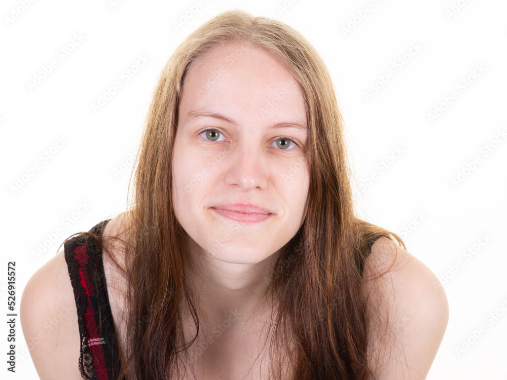 Head shot of beautiful caucasian woman with long haircut looking confident standing in dress on white background