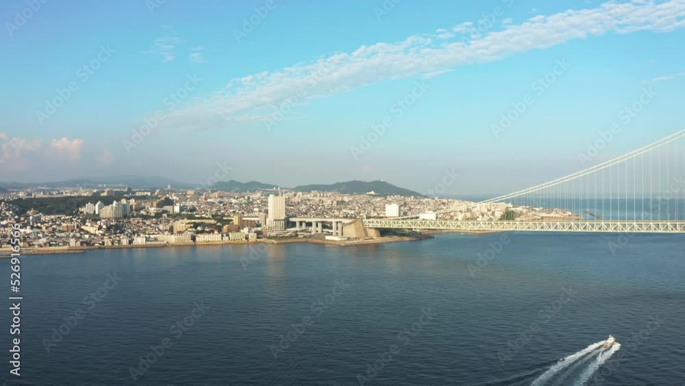 Coastline of Akashi, Hyogo Japan, Aerial View of City and Suspension Bridge Coastline of Akashi, Hyogo Japan, Aerial View of City and Suspension Bridge