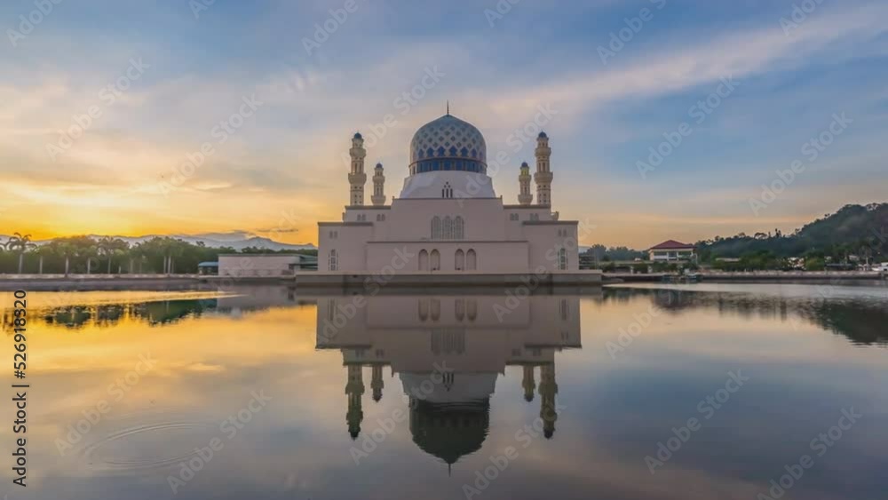 Putra Mosque is the principal mosque of Putrajaya, Malaysia. Building on the left is Perdana Putra which is Malaysian Prime Minister's office. (time-lapse)