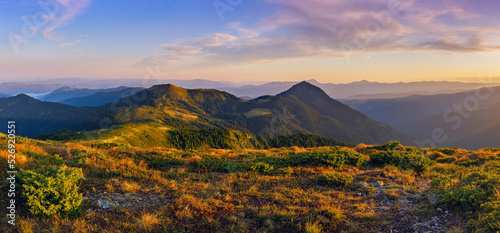 Amazing morning mountain landscape. Dawn in the autumn Carpathians. Golden hour in the mountains