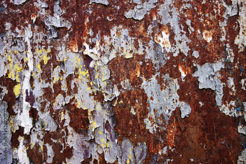 old rusty wall with traces of glue and paper © Photowards