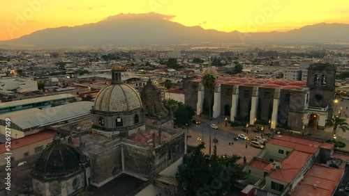 Parroquia del Sagrario And Ciudad Guzman Cathedral During Golden Hour In Jalisco, Mexico. - aerial photo