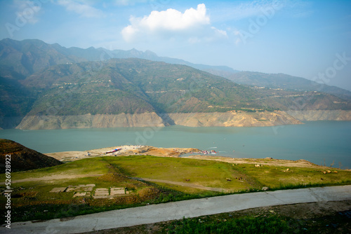 Obraz na płótnie Tehri lake surrounded by mountains in Uttarakhand, india, Tehri Lake is an artificial dam reservoir. Tehri Dam, the tallest dam in India and Tehri dam is Asia's largest man-made lake. w salonie