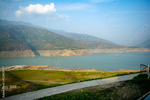 Obraz na płótnie Tehri lake surrounded by mountains in Uttarakhand, india, Tehri Lake is an artificial dam reservoir. Tehri Dam, the tallest dam in India and Tehri dam is Asia's largest man-made lake. w salonie