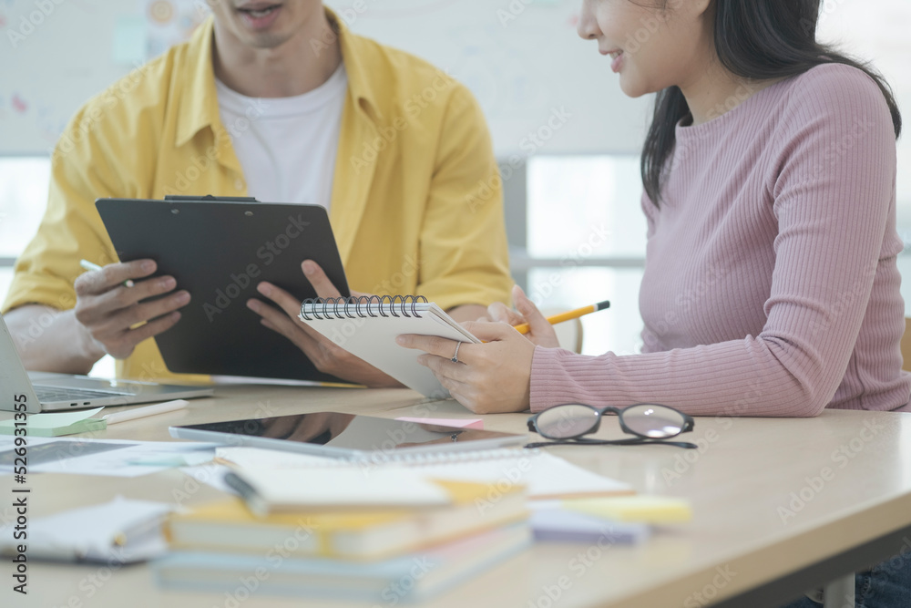 Two professional business colleagues have working, discuss business ideas together. Two professional business colleagues have working, discuss business ideas together.