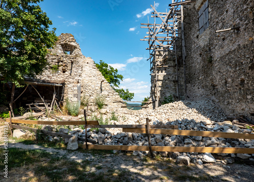 The ruins of Vinne Castle and its surroundings in the Zemplin region of Slovakia during reconstruction photo