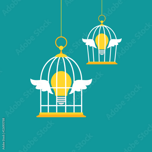 Locked golden bird cages with golden light bulb. Trap, imprisonment, jail concept.