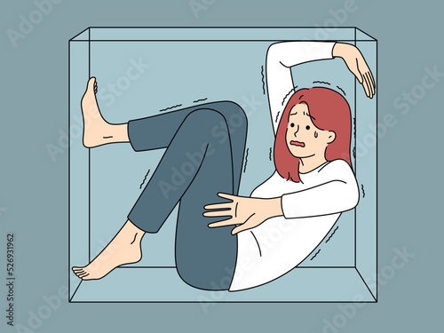 Stressed woman scared sitting in box