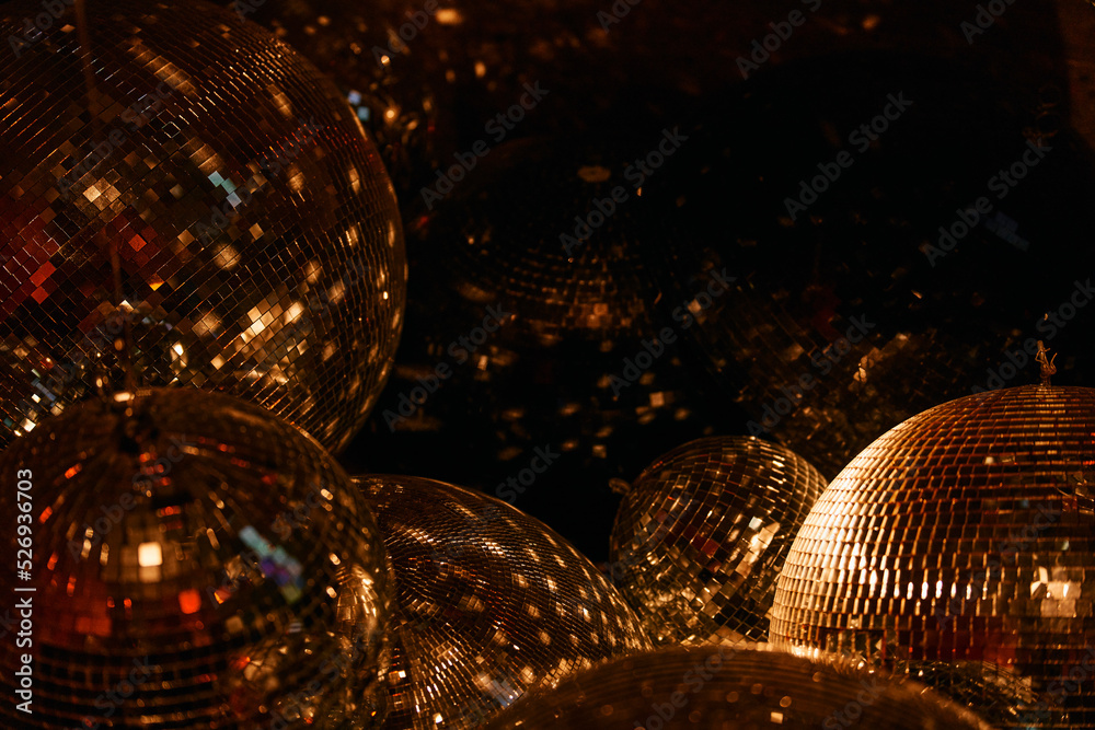 Close up sparkly gold disco balls Stock Photo