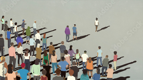 People walking away from large crowd
