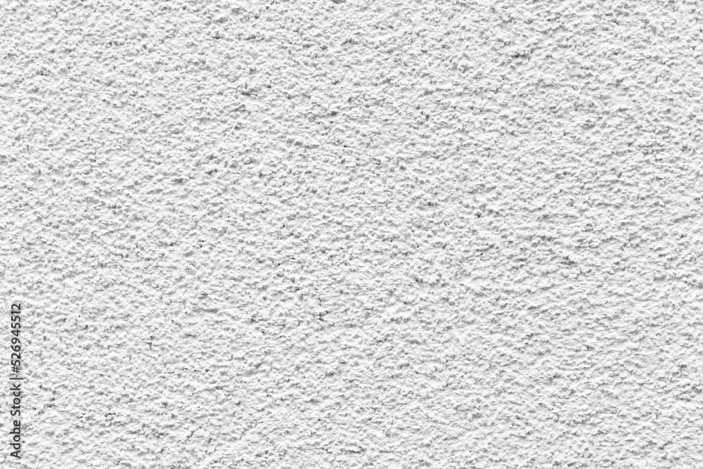 Sample of a texture of white plaster. Wall finished with a decorative cement stucco. Example of exterior building decoration. Clean uniform grainy background. Banner. Wallpaper. Copy space. Pattern Sample of a texture of white plaster. Wall finished with a decorative cement stucco. Example of exterior building decoration. Clean uniform grainy background. Banner. Wallpaper. Copy space. Pattern