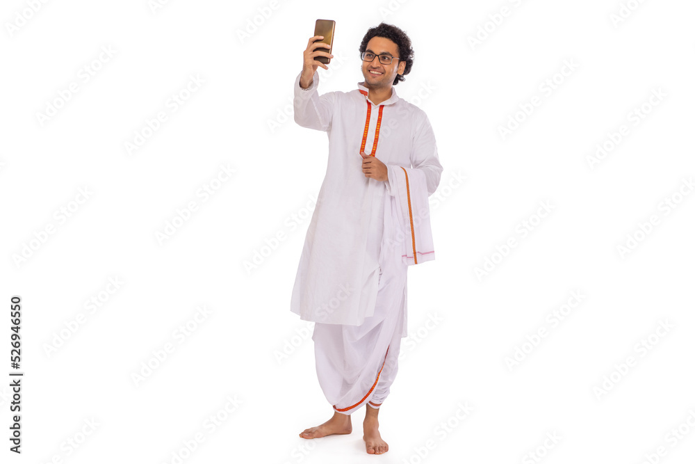 Portrait of Bengali man having videocall through mobile phone Portrait of Bengali man having videocall through mobile phone