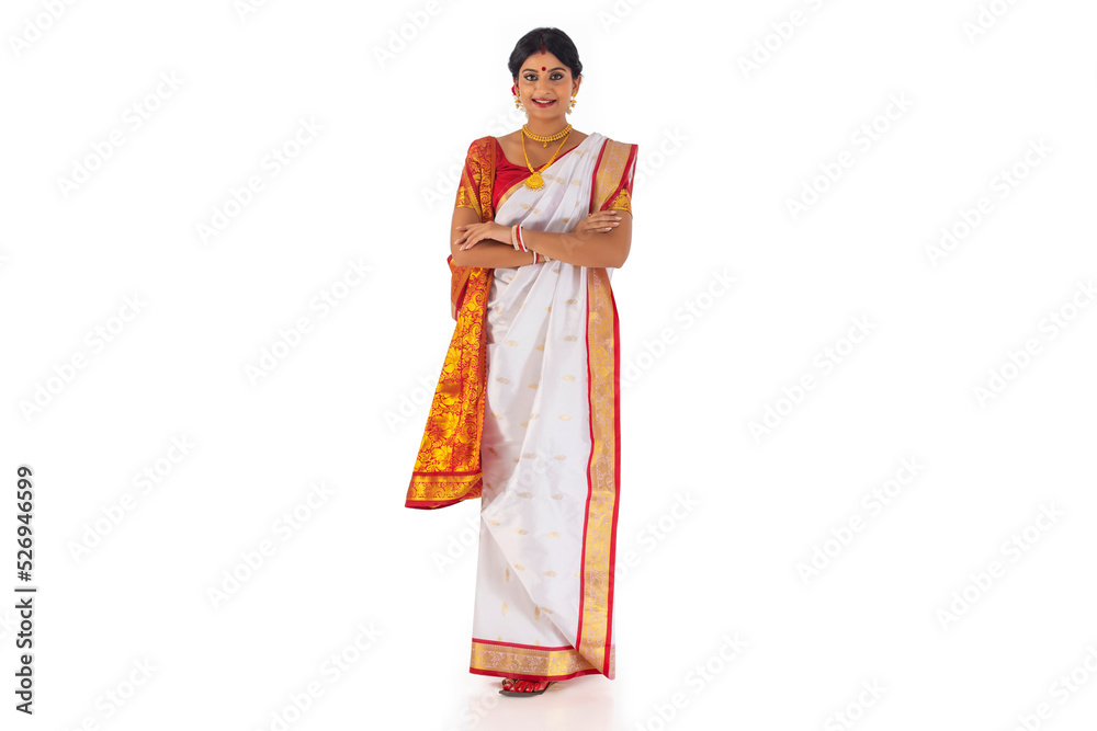 Portrait of Bengali woman in tradition clothing against white background