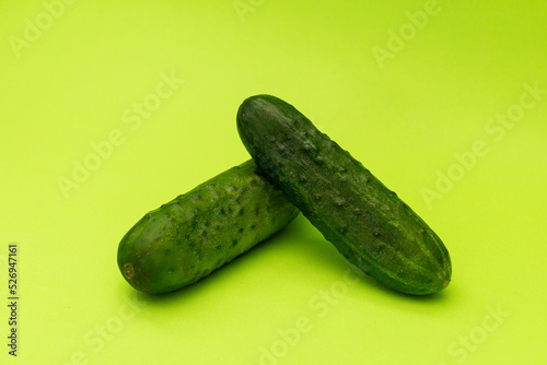 Cucumbers on a green background  monochrome
