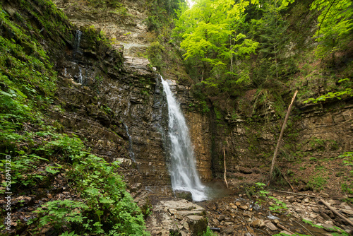 Manyava waterfall in Ukraine summer landscape