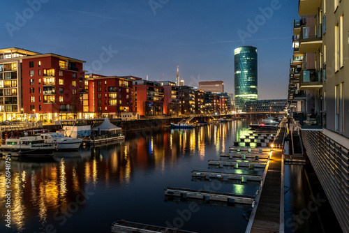 Frankfurt West harbour with Main tower and water ways for boats photo