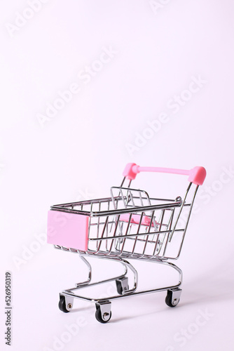 Metalic supermarket car, pink, isolate