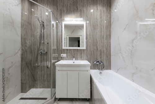 stylish bathroom interior design with tiles and lighting