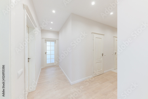 a large bright corridor in the new interior design of the house