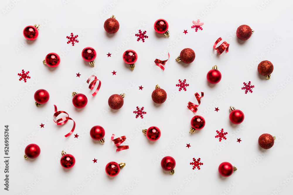 Christmas composition. a pattern of christmas balls on colored background. Flat lay, top view New year decor