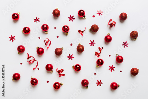 Christmas composition. a pattern of christmas balls on colored background. Flat lay, top view New year decor