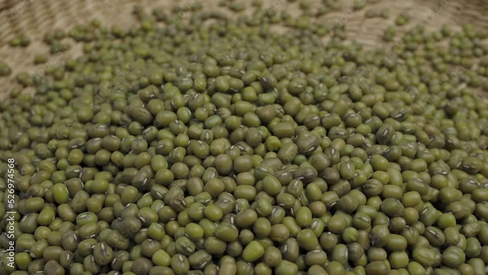 Pile of raw green mung beans or Vigna radiata seeds Pile of raw green mung beans or Vigna radiata seeds