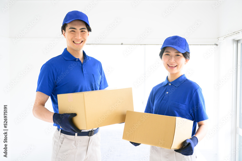 Image of staff carrying cooperatively in a move Image of staff carrying cooperatively in a move