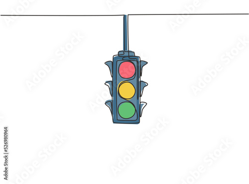 Single continuous line drawing of traffic lights that are placed hanging above the highway crossing. There are four direction traffic lights. Dynamic one line draw graphic design vector illustration.