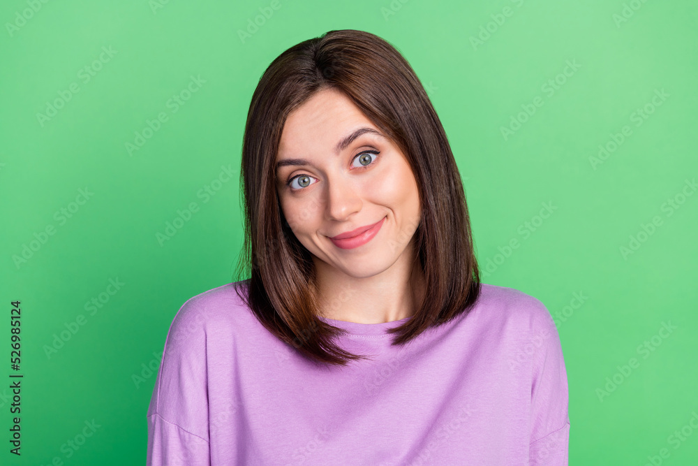 Closeup photo of young gorgeous funny woman smiling ignore you have low salary isolated on green color background Closeup photo of young gorgeous funny woman smiling ignore you have low salary isolated on green color background