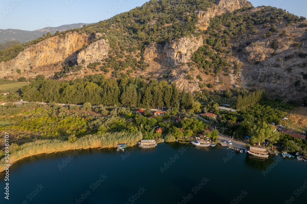See Lycian Rock Tombs, one of the ancient architectural wonders of Turkey, carved into the cliffs facing the town of Dalyan. Mugla-Turkey