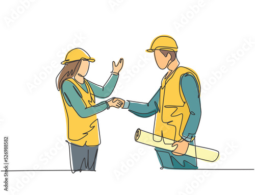 One line drawing of young architect woman and builder foreman wearing construction vest and helmet handshake to deal a project. Great teamwork concept. Continuous line drawing vector illustration