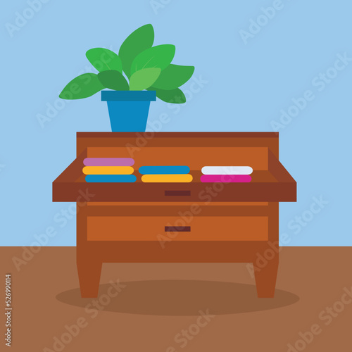 chest of drawers with neatly folded things