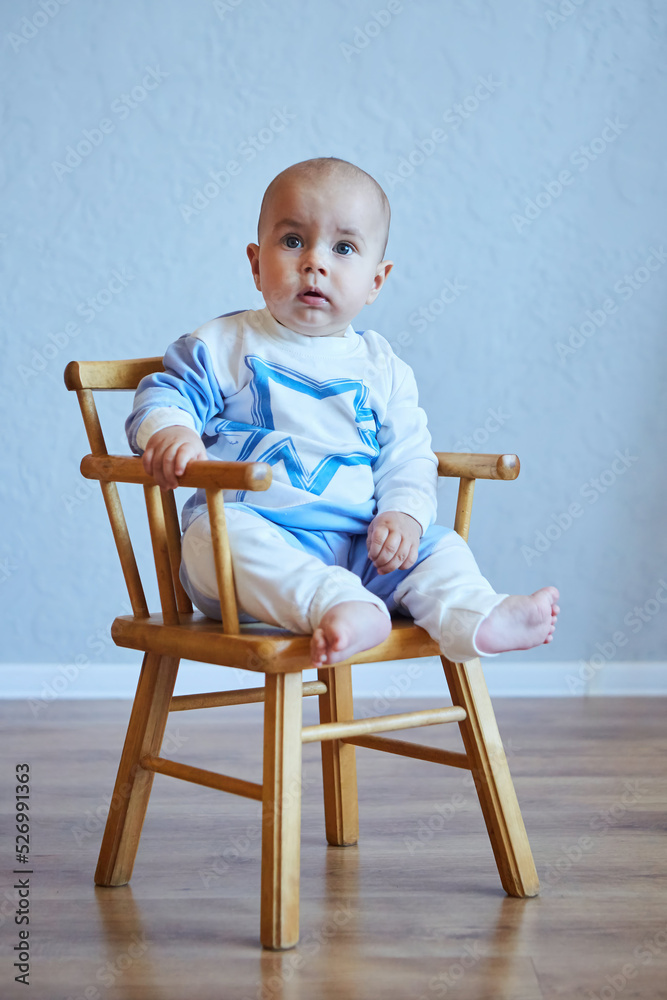 A small newborn baby boy. The concept of childhood A small newborn baby boy. The concept of childhood