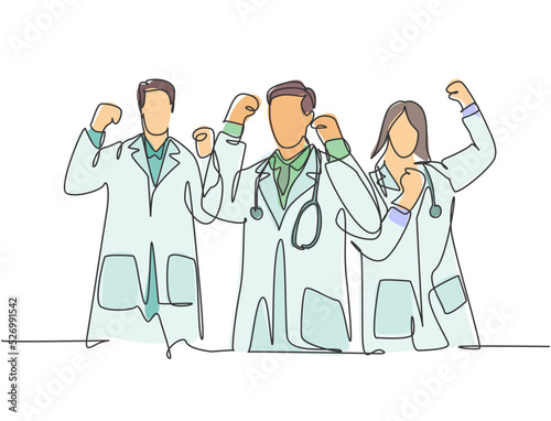Fototapeta Naklejka Na Ścianę i Meble -  Continuous single line drawing of group of male doctor and female doctor celebrating their successful cure a patient. Medical health care services concept one line draw design vector illustration