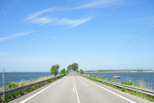Road embankment between the islands Bogø and Møn in Denmark