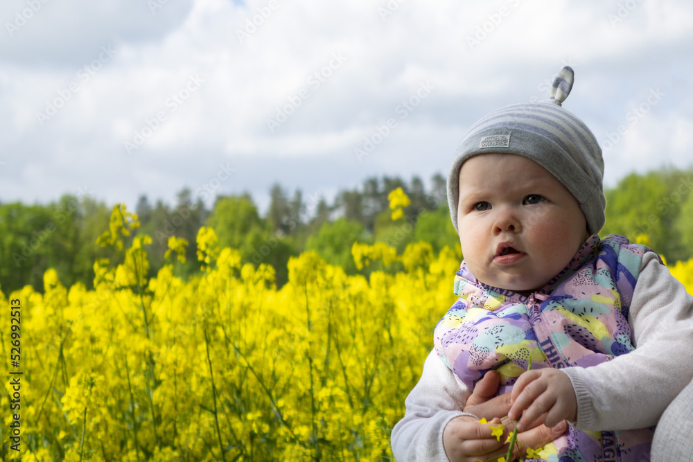Curious baby on a field Curious baby on a field